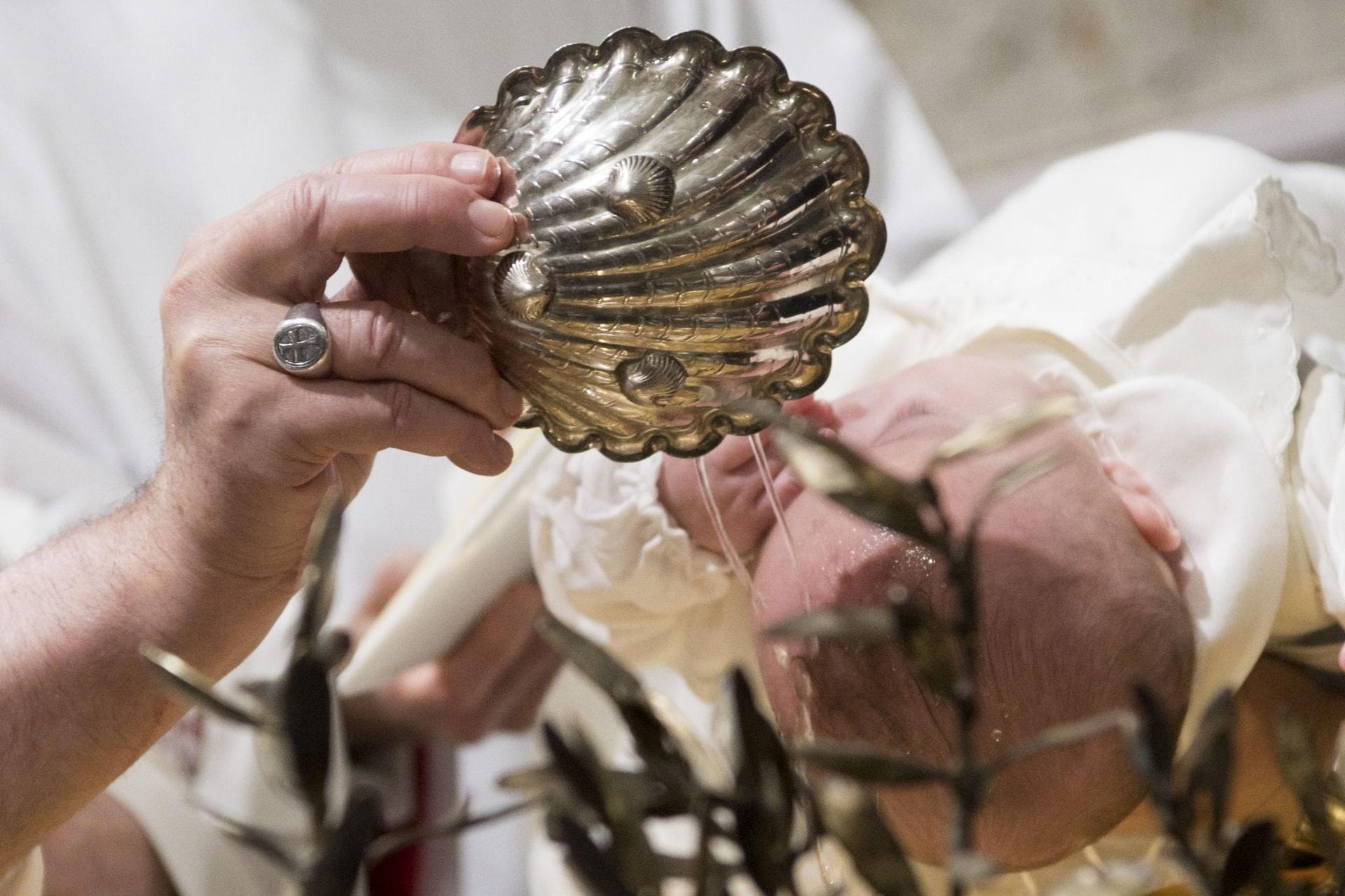 Baptizing babies, Pope Francis defends practice of infant baptism