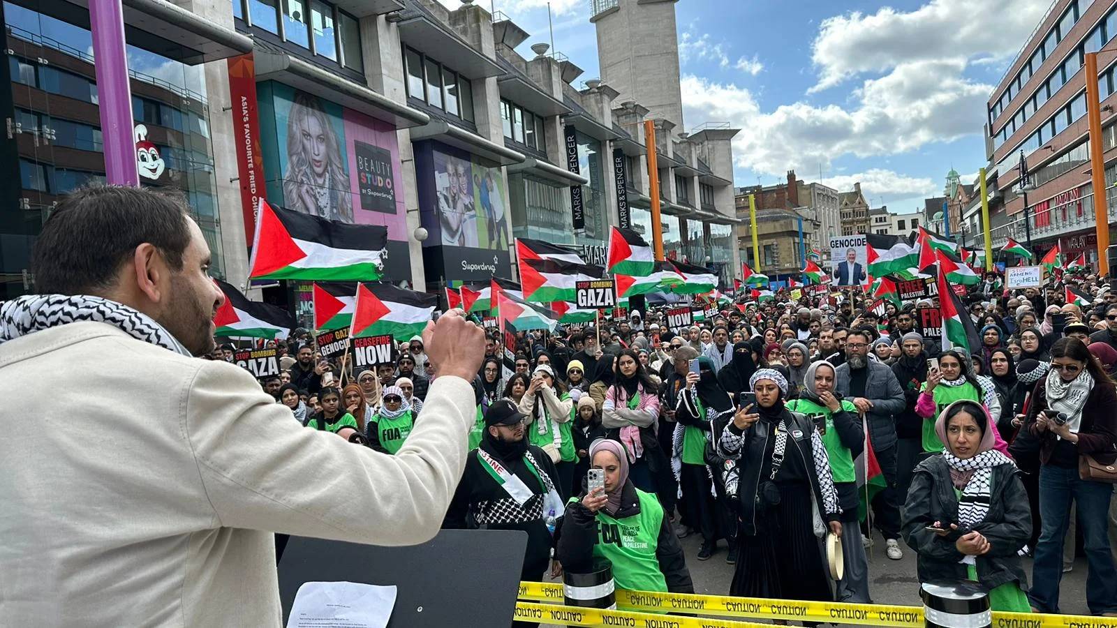 Before his election to Parliament, Shockat Adam speaks to voters in the city center of Leicester, England. (Credit: Shockat Adam for Parliament.)